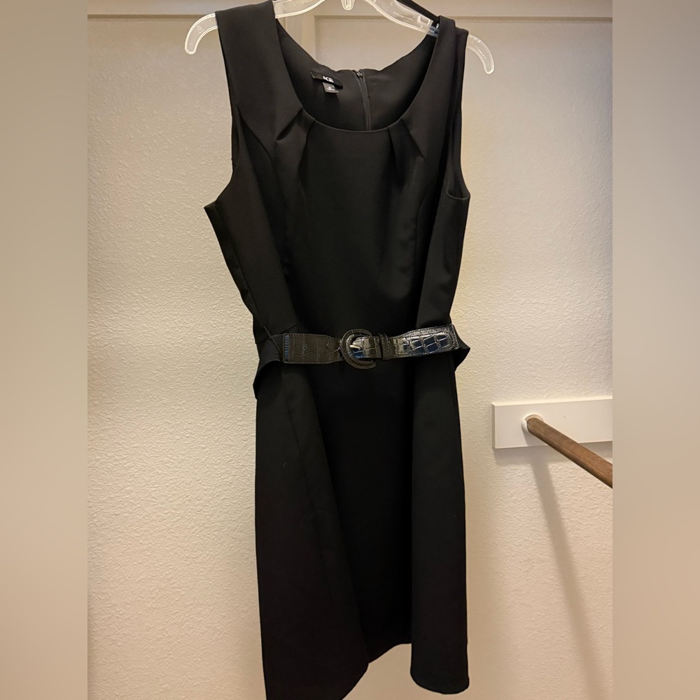 Woman’s belted dress